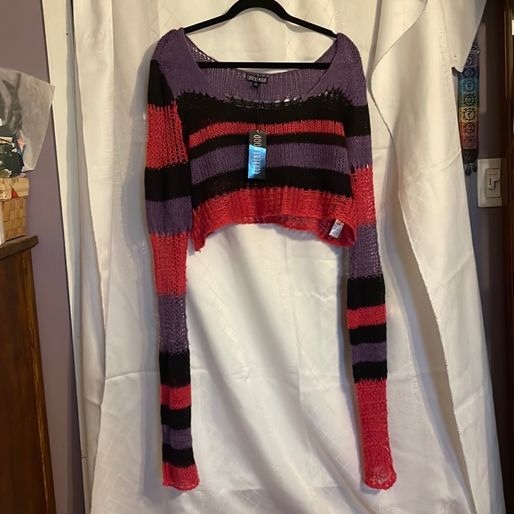 Dolls Kill XL striped crop extra long arm sweater in pink, purple and black